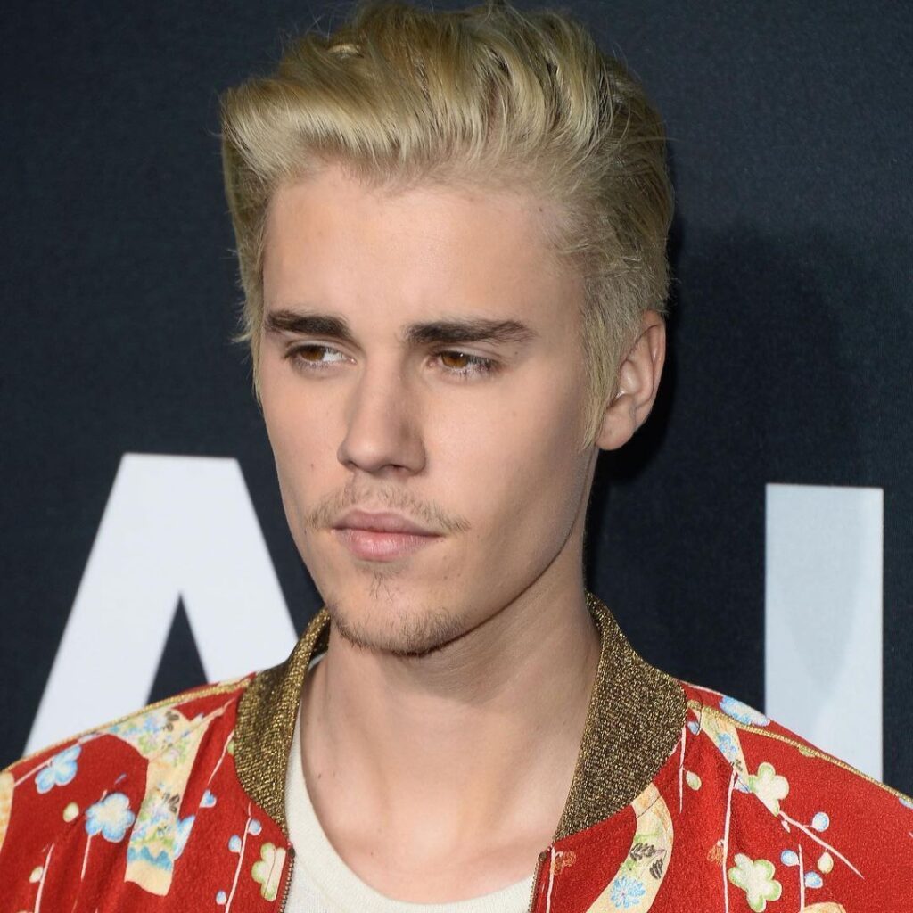 a quien le vendio Justin Bieber los derechos de su catálogo de música